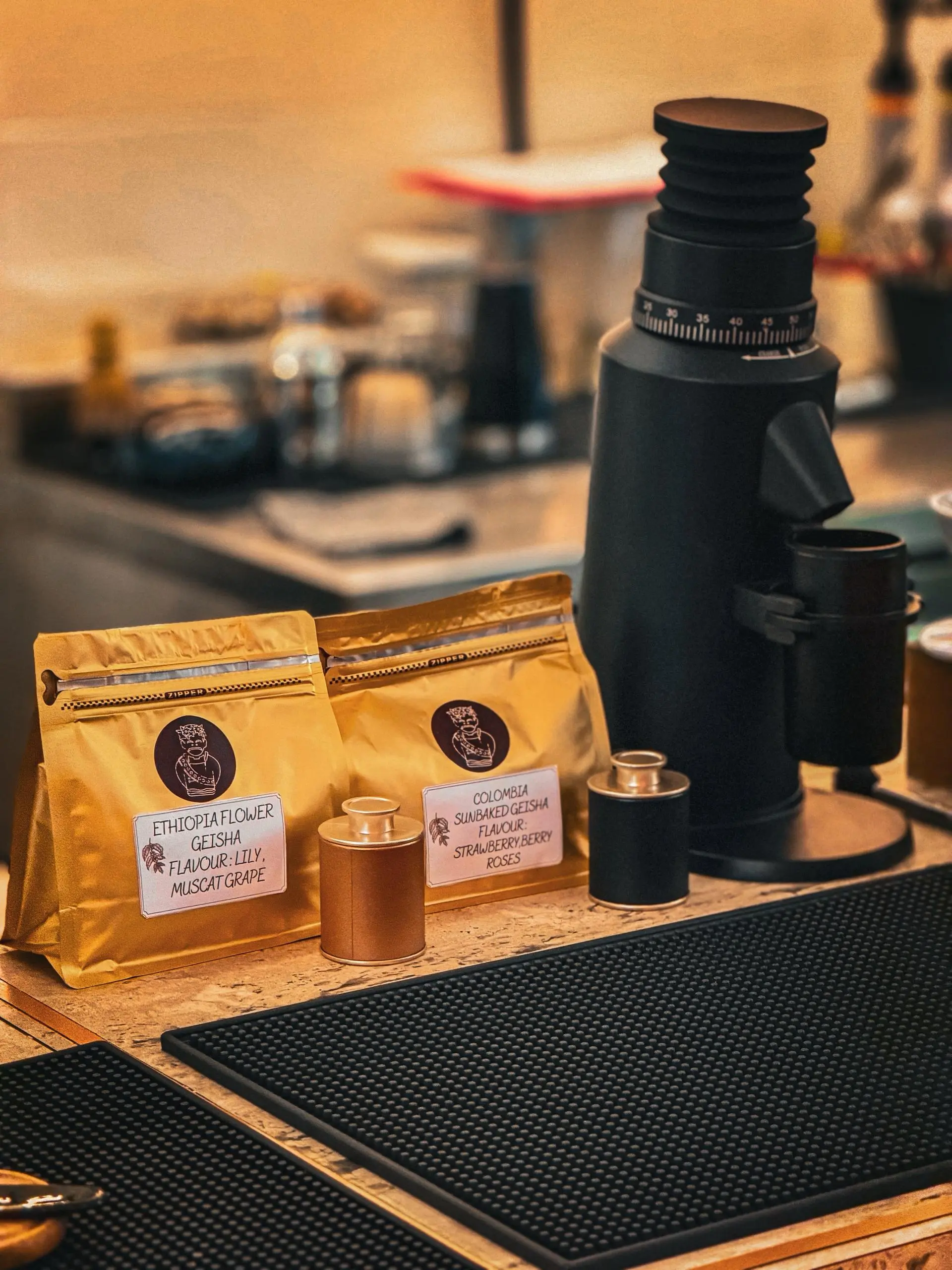 Single-origin coffee beans and grinder at Pointers Café